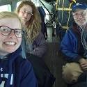 Hana, Kailey, and Rob on a plane.